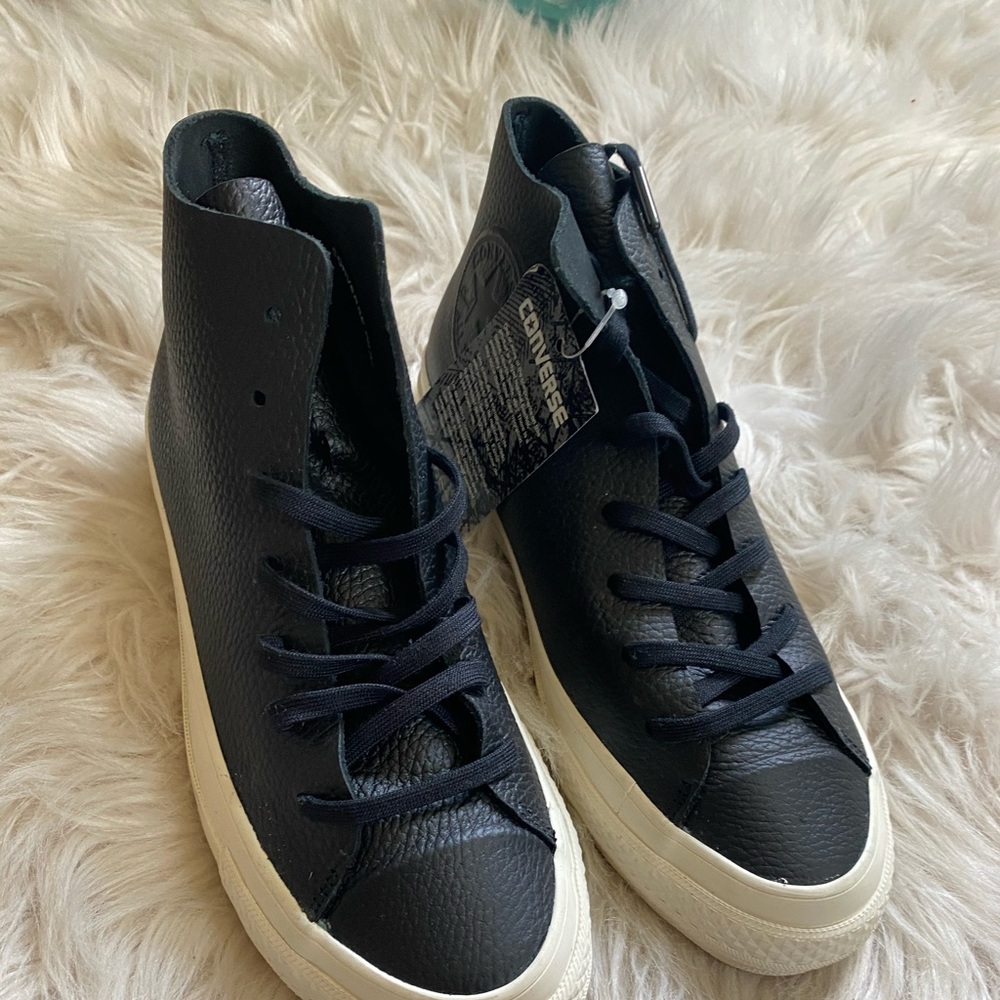 - Leather High Top Converse